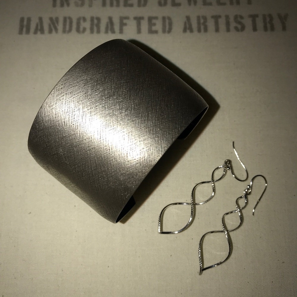 Cuff bracelet earrings no longer availiable With Bracelet.